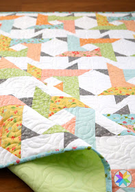 Windy City quilt pattern from A Bright Corner - a layer cake pattern in four sizes but you can also use jelly roll strips, yardage, or fat quarters