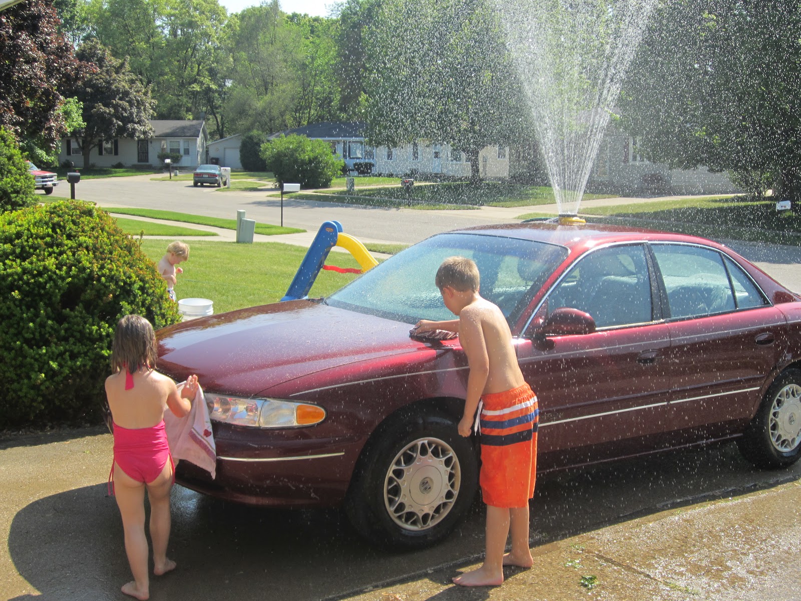 3 kids and a Mortgage Later Car Wash while we can!