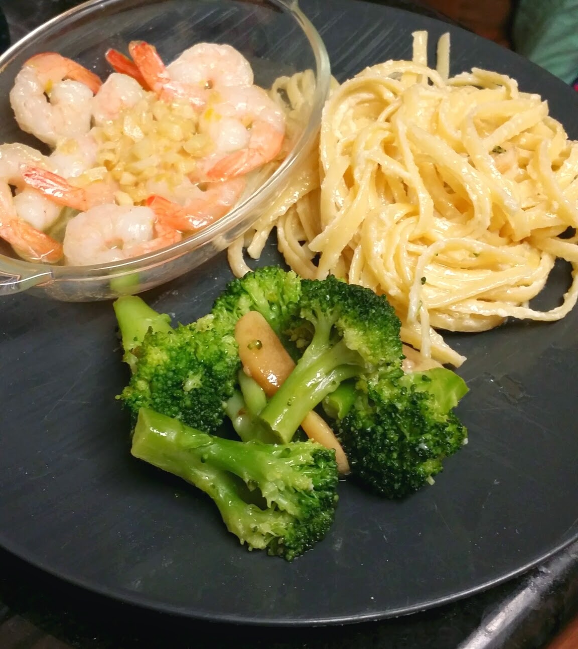 A Plate of Deliciousness Shrimp Scampi with Alfredo Linguini and Broccoli