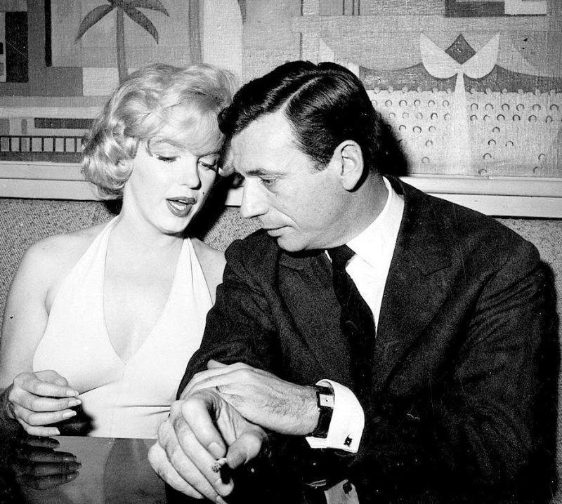 Photos of Marilyn Monroe and Yves Montand at a Press Party for “Let’s ...