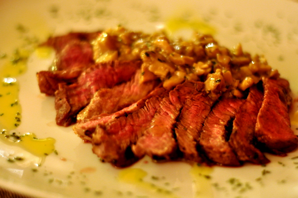 Tagliata Toscana di Filetto con Funghi Porcini / Tuscan Tenderloin with Chopped Porcini Mushrooms at Ristorante Malborghetto in Lecchi, Italy - Photo by Taste As You Go