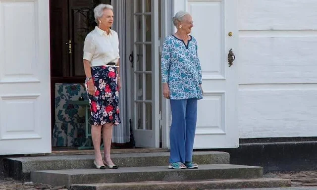 Princess Benedikte wore a floral print skirt and silk top. This Friday's changing of the guards was attended by the Queen and Princess Benedikte