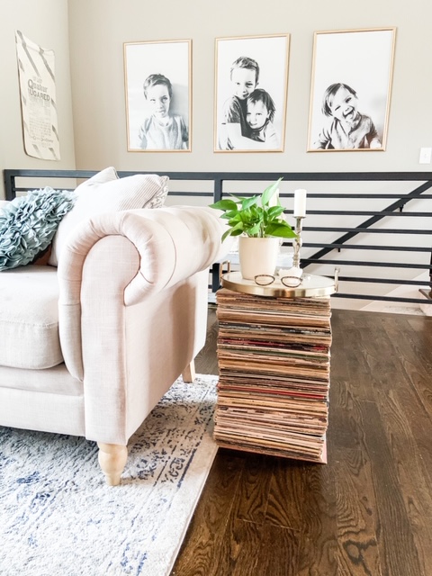 stacked records make a side table