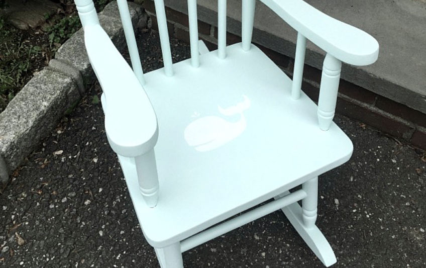 painted rocking chair seat with a whale stencil