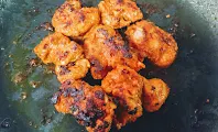 Roasting  crisp golden chicken pieces on Non stick pan for butter chicken Murgh makhani recipe