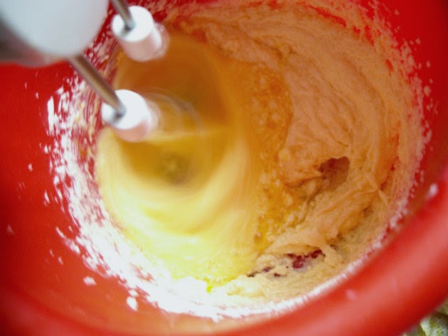 adding eggs to the butter mixture