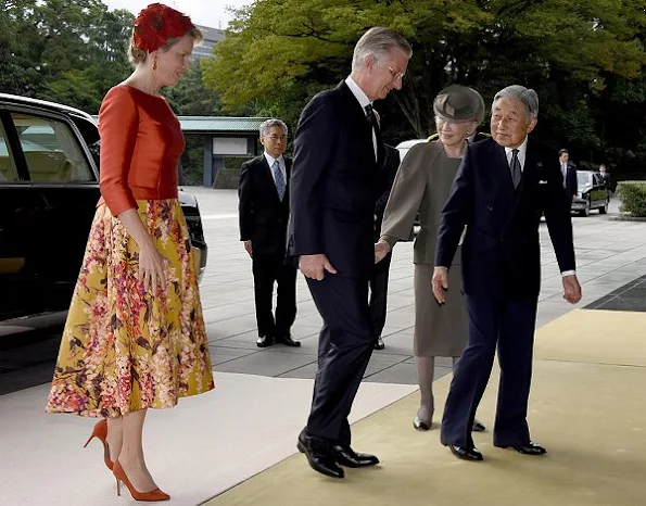 Belgian King Philippe and Queen Mathilde are welcomed by Japanese Emperor Akihito and Empress Michiko upon their arrival at the Imperial Palace. Mathilde Natan Dress