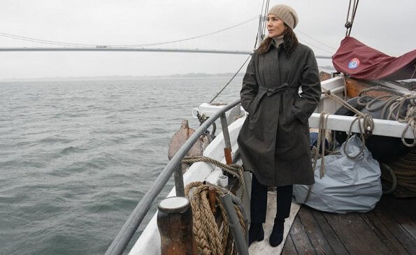Crown Princess Mary attended the celebrations of the 50th anniversary of the new Little Belt Bridge The bridge connects Jutland and Funen. Topshop vinyl trench coat with contrast stitching in green. khaki checked trench coat
