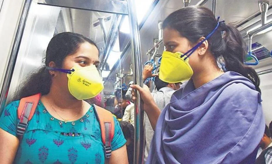 girl in metro train wearing mask