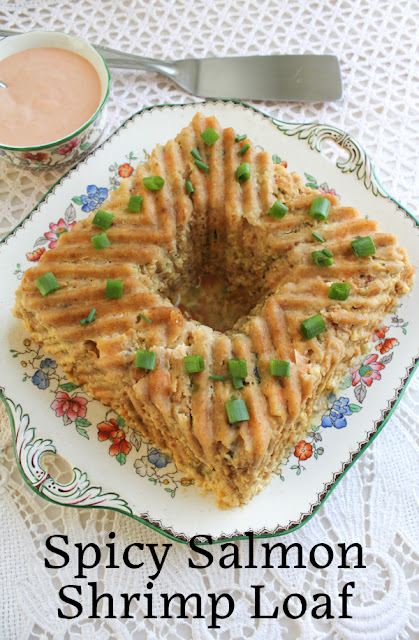 Food Lust People Love: This spicy salmon shrimp loaf is a new take on my popular salmon shrimp burger recipe, baked in a Bundt pan. It is tender and juicy so you don’t need the pink sauce, but I highly recommend it nonetheless. It’s a “meaty” flavorful slice and the perfect main course for your family or even a dinner party. 