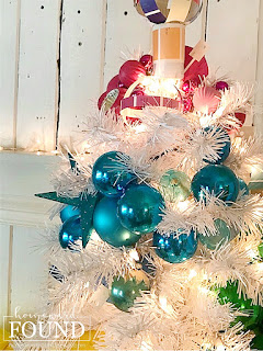 Christmas,Christmas Decor,Christmas Decor Themes,Christmas tree,color,color palettes,colorful home,decorating,diy decorating,DIY,holiday,seasonal,winter,ornaments,colorful Christmas,colorful Christmas decor, roygbiv,color gradient,rainbow aesthetic,decorating with color,merry and bright Christmas decor,garlands on Christmas trees,tree garlands,DIsneyland Christmas tree ornaments,Disney,rainbow swirl Christmas tree decor