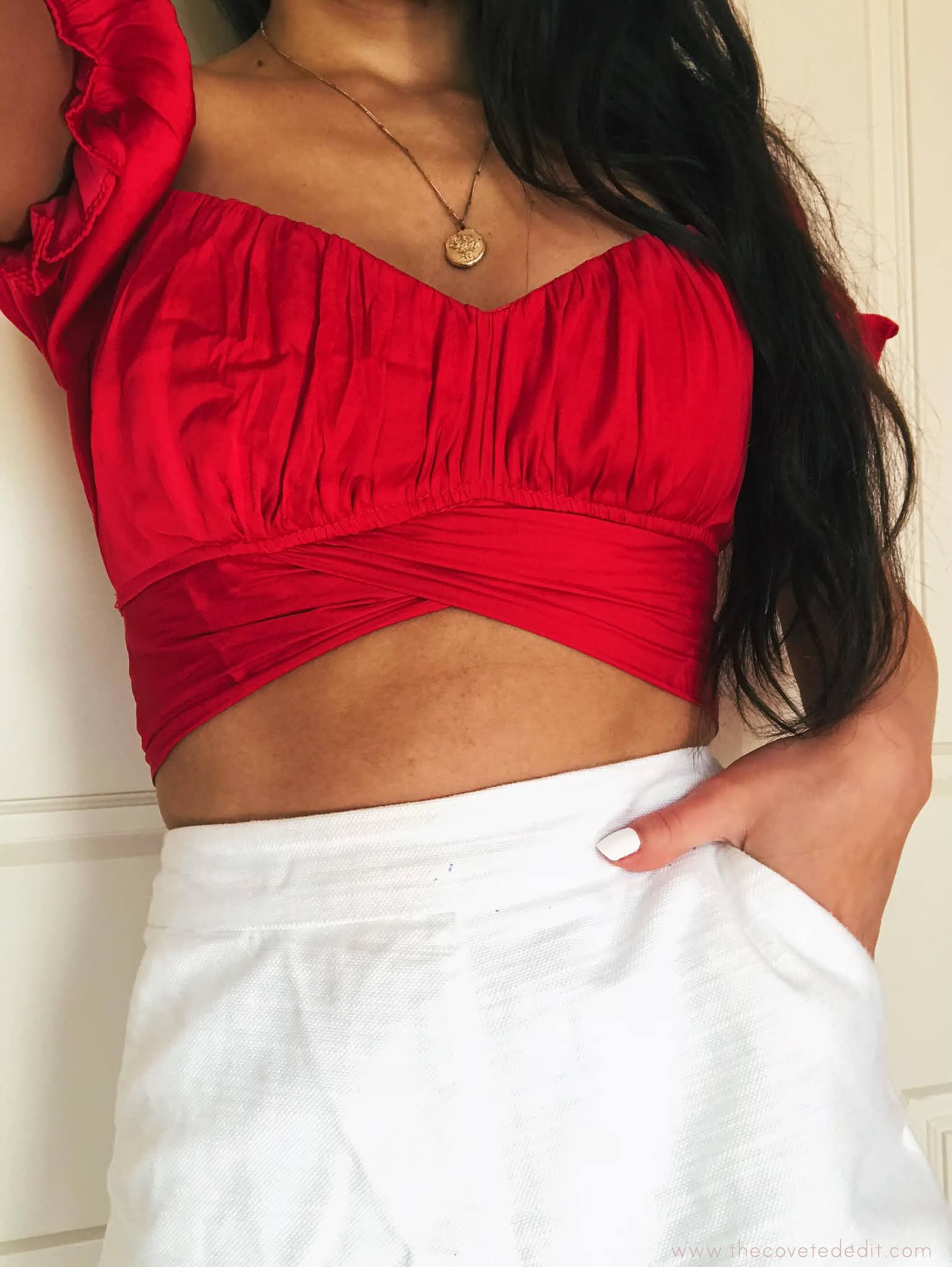 Red off the shoulder top and white shorts