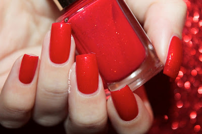 Swatch of the nail polish 430 - Chili Pepper Red de Kiko