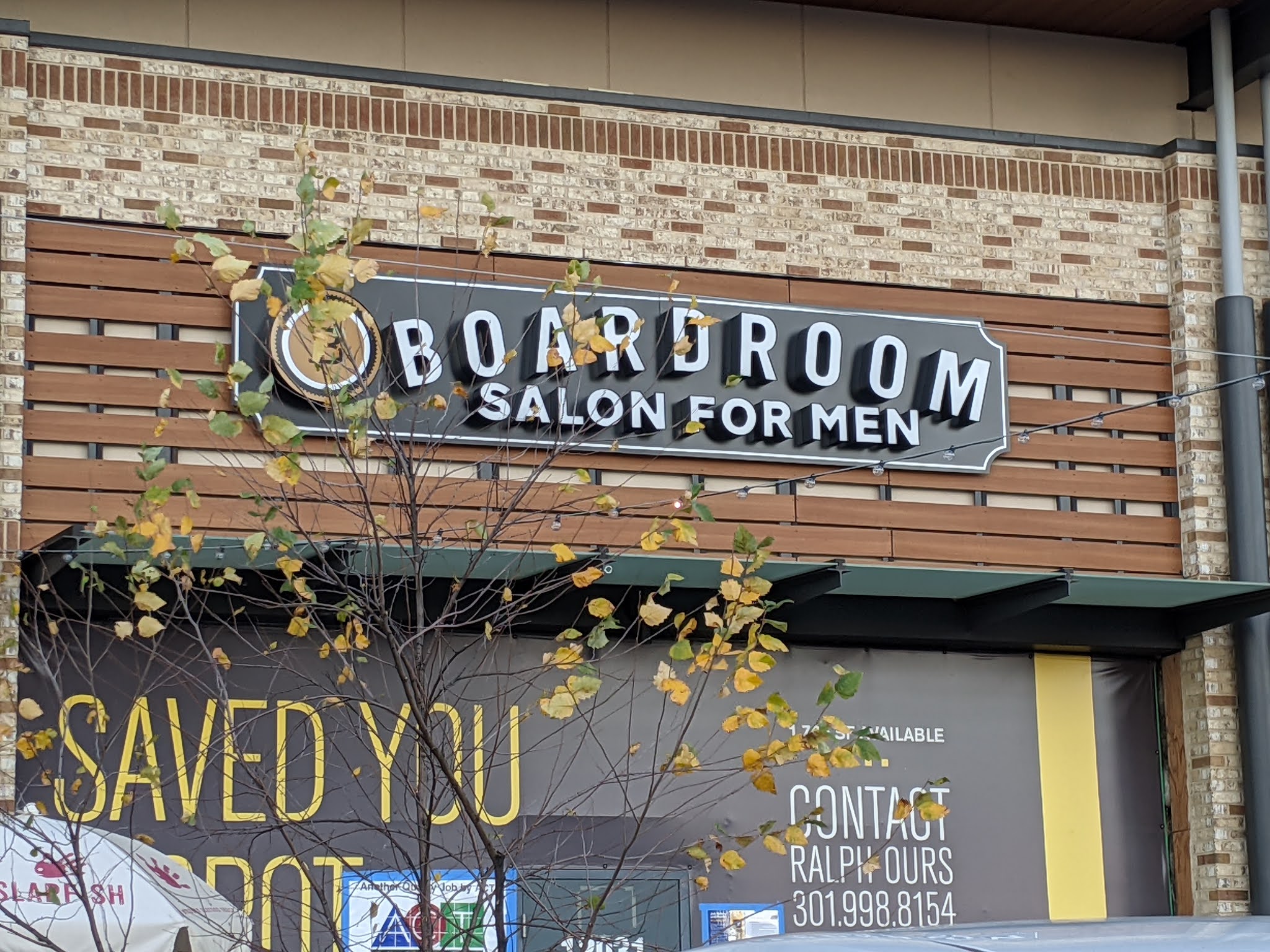 Rockville Nights Sign installed at Boardroom Salon for Men in Rockville