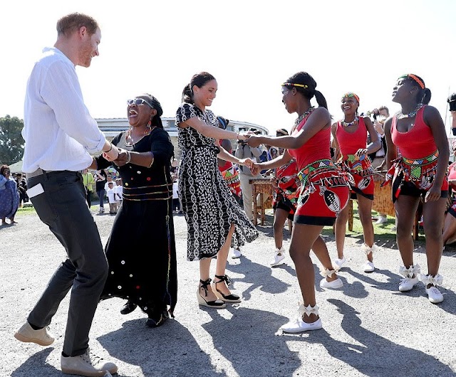 Harry and Meghan receive rousing welcome as they arrive in 'South Africa's murder capital' (Photos)