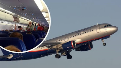 pilot emergency landing attack heart after dies aeroflot during mid having air suspected suffered cockpit forced plane