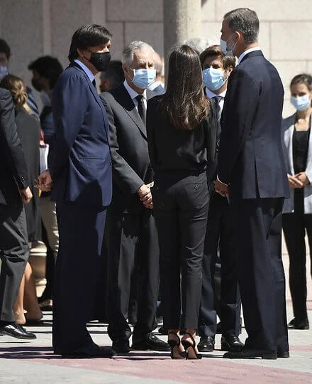 King Felipe and Queen Letizia attended Jaime Carvajal Funeral at Funeral home La Paz. Letizia wore a black slingback pumps from Carolina Herrera