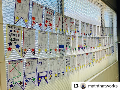 Yvette from @maththatworks posted this photo on Instagram of her window display made with her students' systems of equations pennants.