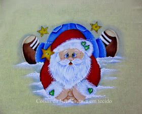 pintura em tecido com tema natalino papai noel deitado na neve