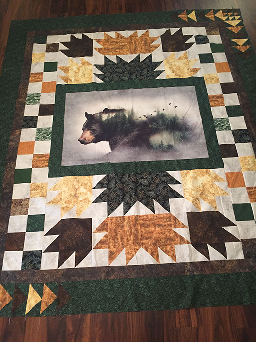 Call Of The Wild - Bear Quilt designed By Kari Nichols of Mountainpeek Creations for Bear Creek Quilting Company, Featuring the Call of the Wild digital fabric along with Bali Batiks and Watercolors