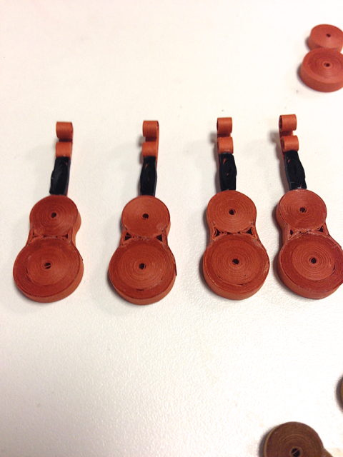 quilled violin bodies in progress