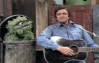 Johnny Cash sings Nasty Dan for Oscar The Grouch. Sesame Street Best of Friends