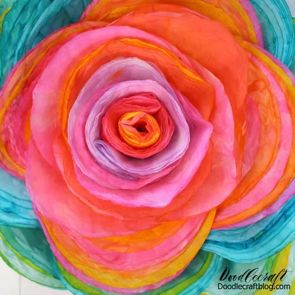 115 layers of vivid hand dyed coffee filters formed into a giant stunning rose.