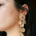 Golden statement earrings