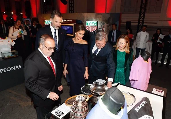 King Felipe. Queen Letizia wore DELPOZO flower embellished long-sleeved dress at As Sports Awards