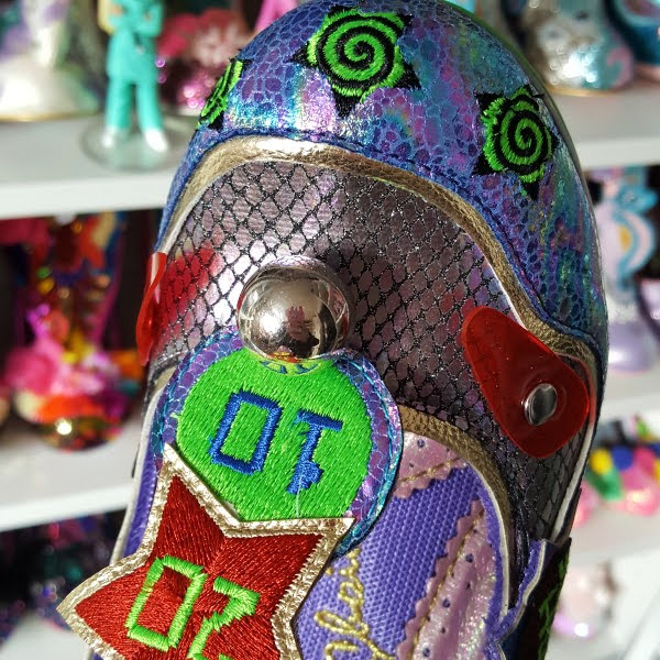 close up of pinball detail on front of shoe