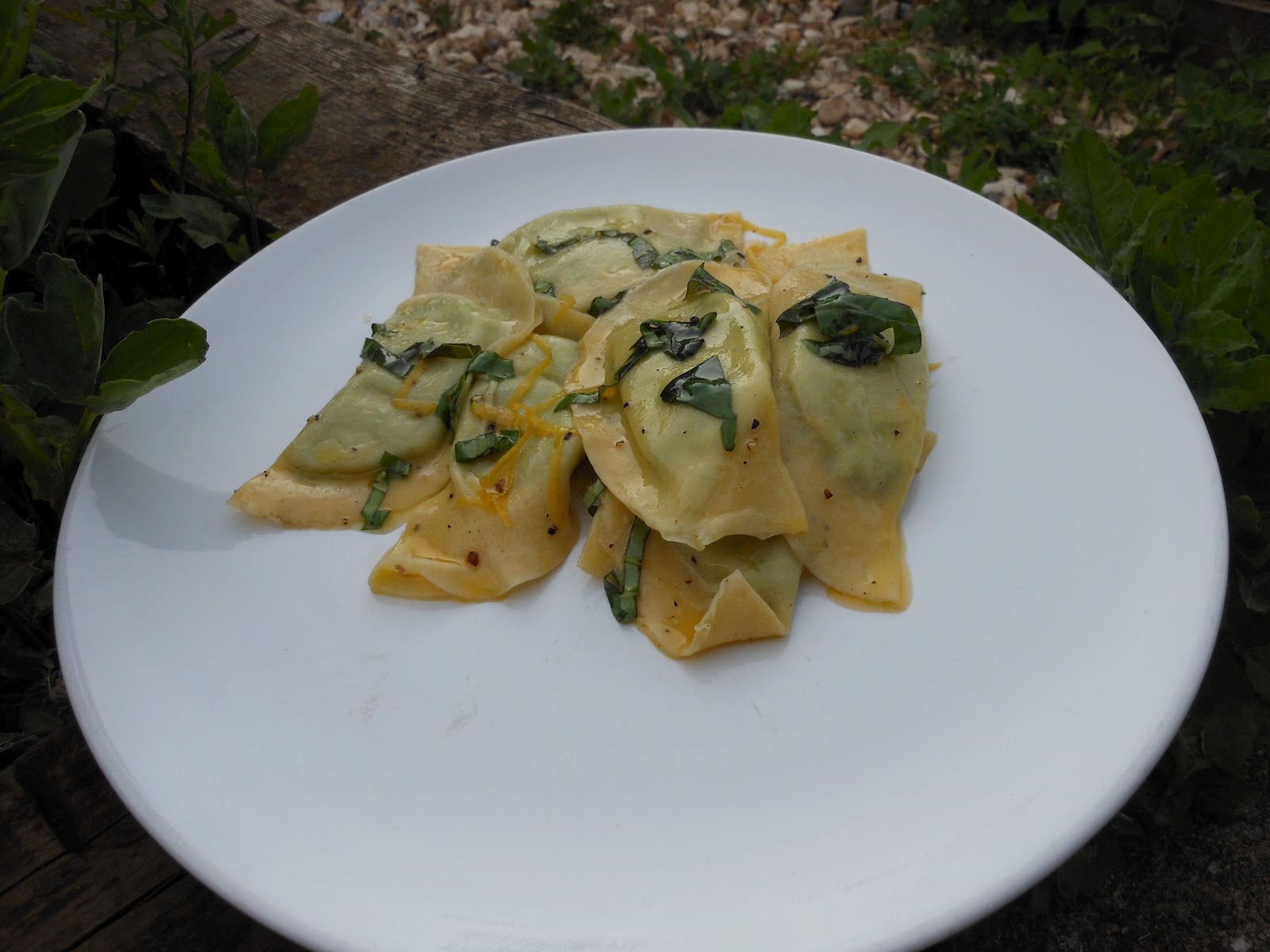 Poppy Leeder's Kitchen & Garden Pea, hop shoot and goat cheese mezzaluna