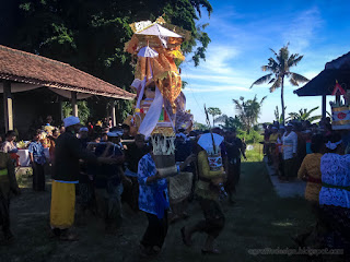 People Carrying Wooden Wadah Move Around The Burning Place In Balinese Ngaben Ceremony At The Village