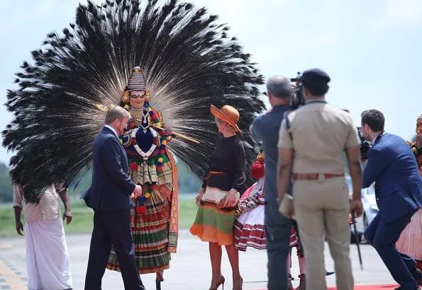 Queen Maxima wore Jan Taminiau short dress. Queen Maxima wore a pattern print silk dress by Jan Taminiau in India