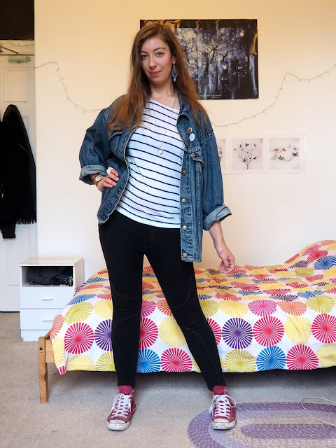 Vintage - outfit of second hand thrifted blue denim jean jacket, white striped top, black leggings & red Converse