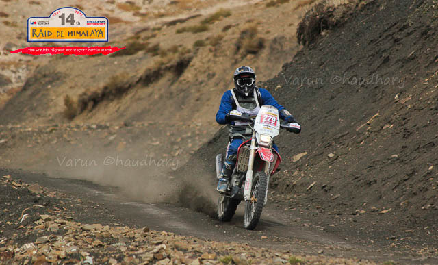 Raid de Himalaya is one of the premier Motorsports event in India, which starts form Shimla, Himachal Pradesh and concluded at Shrinagar (Jammu & Kashmir) after 8 days of action filled days in himalayas. This Photo Journey shares some of the wonderful photographs by Motorsports Photographer Varun Chadhary who has been covering many other Motorsports rallies in India. Let's check out and explore more about Raid De Himalaya action from 2012...Varun has shared lot of wonderful Photo Journeys in past and one of the wonderful Motorsports Photographer in the country. The 14th Maruti Suzuki Raid-de-Himalaya started from Shimla and after that rally/participants traversed a distance of 1800 kms over a span of six days. Raid de Himalaya 2012 was flagged off from Peter Hoff Hotel which is located in Chaura Maidan region of Shimla Town in Himachal Pradesh.The 14th Maruti Suzuki Raid-de-Himalaya was concluded at Leh. Suresh Rana and Parminder Thakur were adjudged the winners of the X-treme 4Wheel category and C.S. Santosh was declared as the winner of the Xtreme 2Wheel categoryK. Prasad and M. Chandrashekhar were declared the winners in the Adventure 4Wheel category. In all, 17 teams in the X-treme 4Wheel category, 40 teams in the 4Wheel Adventure category and 20 bikers could reach the final leg that concluded at Leh.Mahindra XUV500 at 14th Raid de Himalaya 2012 !!!The Moto Xtreme category which is the toughest of the lot is open only to those 4-wheeler drivers who have prior rallying experience and who have competed in one of the earlier editions of the Maruti Suzuki Raid-de-Himalaya. 50 teams participated in the Moto Xtreme 4-wheeler category in this year's event.Mahindra XUV500 splashing out the water on Himalayan terrains during 14th Raid de Himalaya.KTM Duke Motorbike riding through one of the roughest and tough terrains of Himalayas during 14th Raid De Himalaya 2012...Maruti Jypsy crossing through snow covered hills under shining sun and blue sky on the top. A wonderful Click by Varun Chaudhary during 14th Raid De Himalayas 2012Varun is really keen in clicking biker photographs during these motorsports rallies which is quit opposite to many of the other photographers in this areaRaid de Himalaya terrain includes -  Darcha (3360 mts), Keylong (3440 mts), Leh (3524 mts), Kaza (3650 mts), Dhanka (3894 mts), Losar (4079 mts), Rumtse (4300 mts), Kunzum La (4551 mts), Komik (4587 mts), Pang (4600 mts) & Wari La (5313 mts)The Maruti Suzuki Raid-de-Himalaya usually invites participation in three categories: Moto Xtreme, Adventure Trial and Bike Xtreme categories. The participants are grouped in different categories depending upon their prior experience, endurance levels and expertise in handling the escalating difficulty levelsShiny RED Gypsy surrounded by snow covered hills and bright blue sky during 14th Raid de Himalayas 2012 !!On the final ceremony, Mayank Pareek, Chief Operating Officer, Marketing and Sales, Maruti Suzuki, said, 'It was a tough and perilous journey and the winners showed great acumen, stamina and dexterity. This year, we had undertaken a number of extra safety measures like putting in service a helicopter to ensure timely help to rallyists in case of emergencies.' Raid de Himalaya is a test of a competitor's dexterity in handling rough roads, uncertain and extreme weather conditions and the strength and endurance of his vehicle