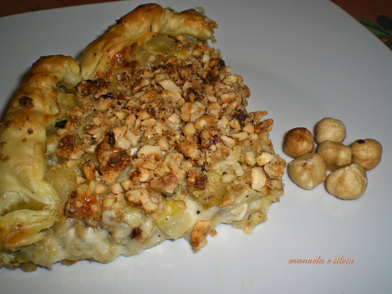 crostata alle zucchine e tartufo con crumble di nocciole