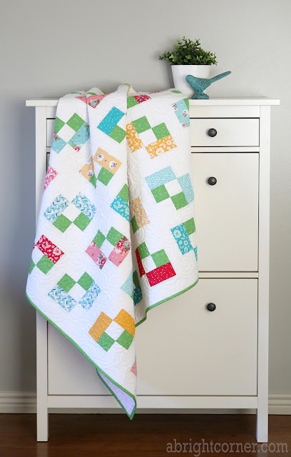 Icebox Cookie baby quilt by Andy of A Bright Corner - a charm pack quilt pattern from Perfect 5 Quilts book 