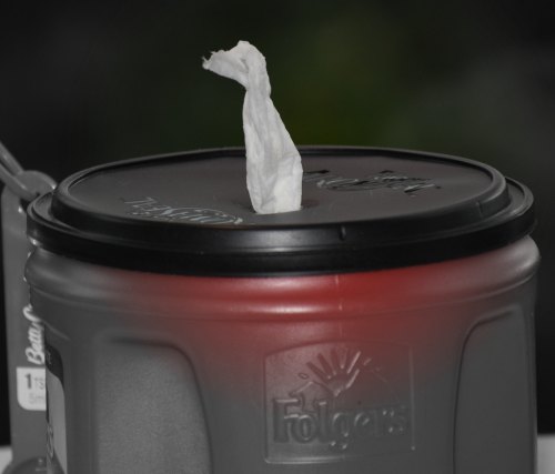 A Folgers Coffee Container Re-purposed as a Wet Wipe Holder