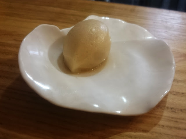 Cider sorbet in a scallop dish  at Isaac At Brighton