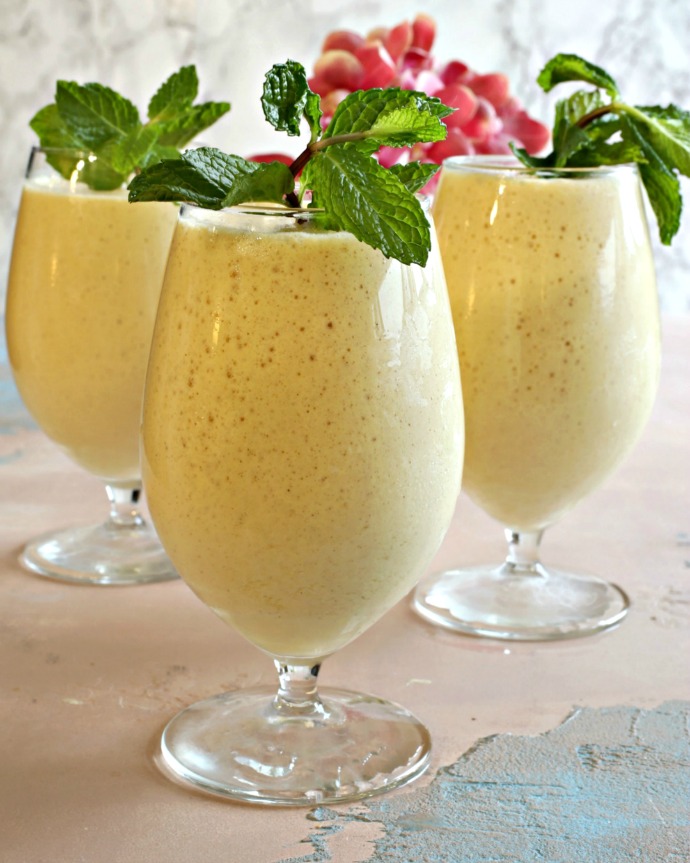 Recipe for a frozen yogurt and mango beverage spiked with rum.