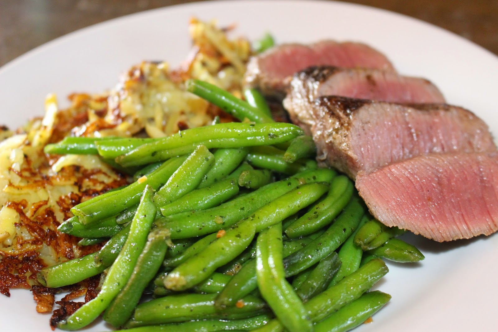 Lammfilet mit Röstis an grünen Bohnen | Kochleidenschaft