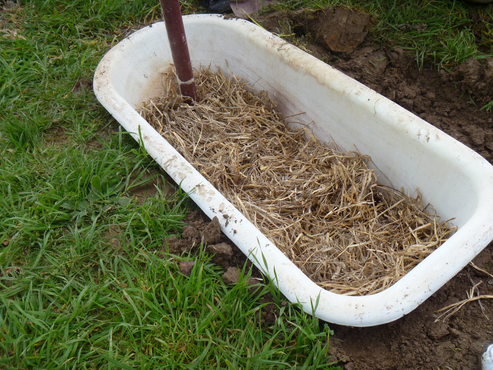 toward sustainability with three kids...... Using old bath tubs to