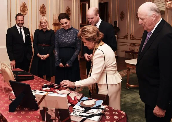 Kate Middleton wears a jacket by Catherine Walker and a maternity dress by Seraphine brand. Mette Marit wore Manolo Blahnik pumps. Queen Sonja