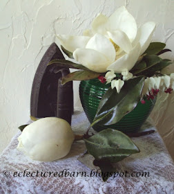 Eclectic Red Barn: Magnolia Flower/Bleeding Heart with old iron Vignette