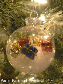 A snow themed ornaments with presents 