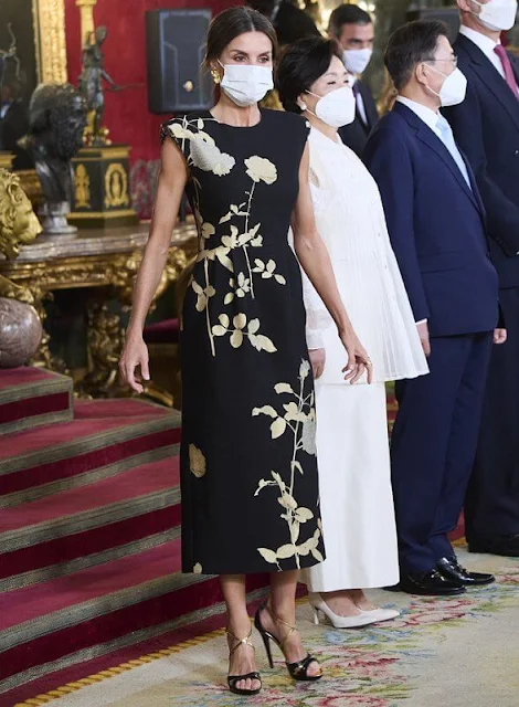 Queen Letizia wore a sequin embellished metallic floral print jacquard midi dress from Dries van Noten. First Lady Kim Jung-sook