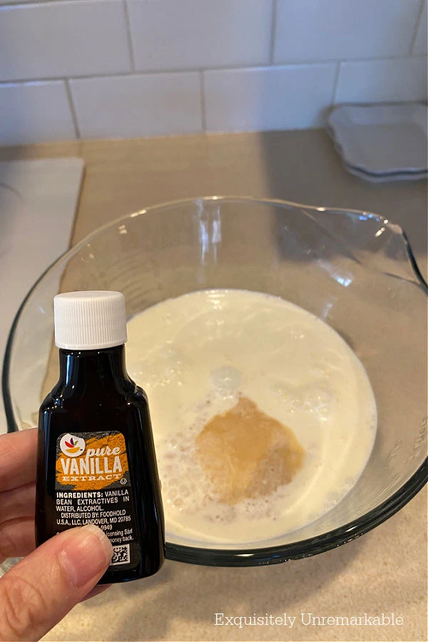 Pure Vanilla For Ice Cream Recipe in front of a bowl of ingredients