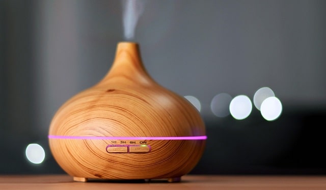 benefits essential oil diffusers focus improve mood