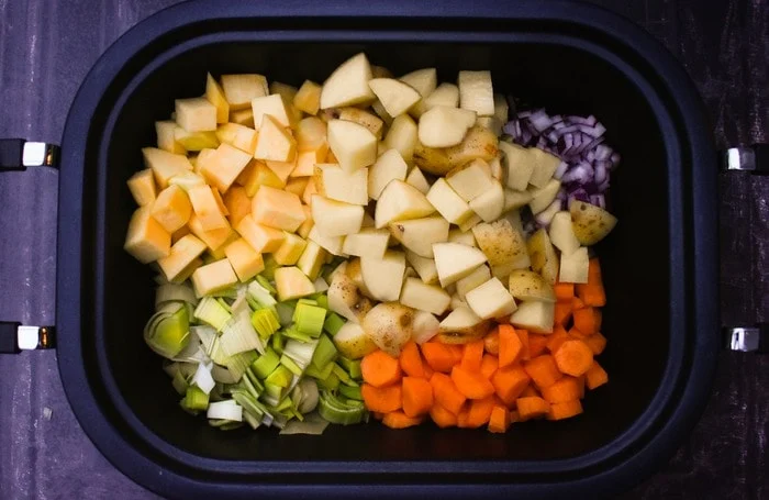 Scottish Slow Cooker Vegetable Soup ingredients in a slow cooker
