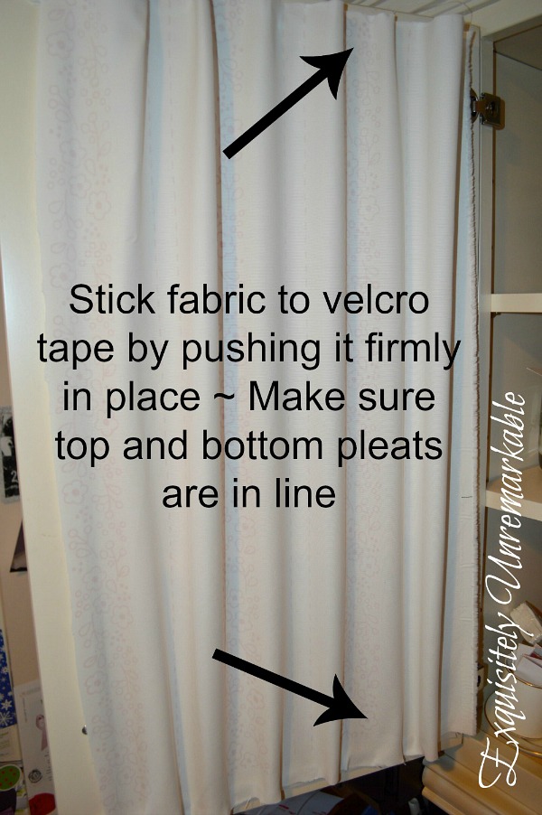 Stick fabric to velcro tape by pushing it firmly in place. Make sure top and bottom pleats are in line text with arrows demonstrating